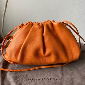Bottega Veneta orange mini pouch crossbody bag